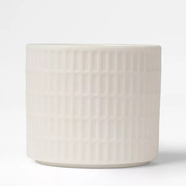 Ceramiczne świeczniki w mlecznobiałą kratkę