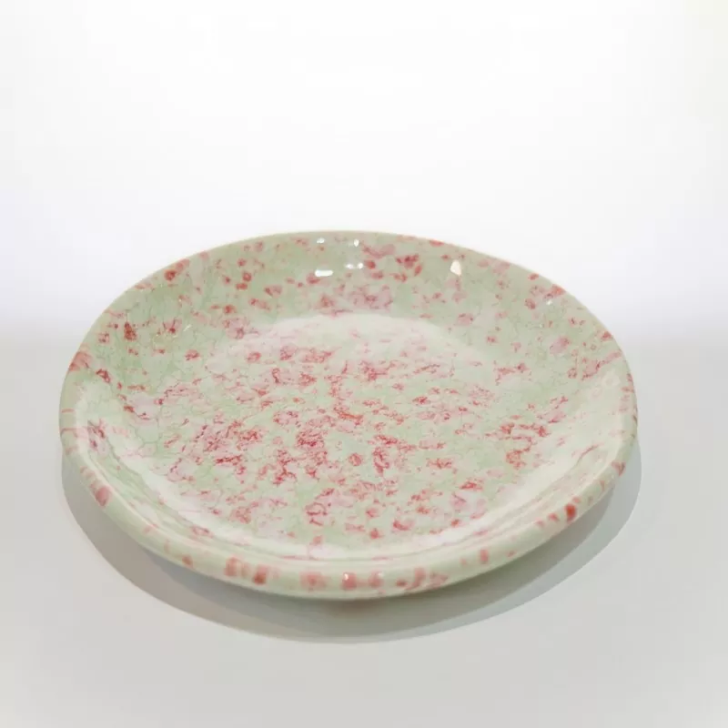 Okrągłe małe nakrapiane naczynie ceramiczne